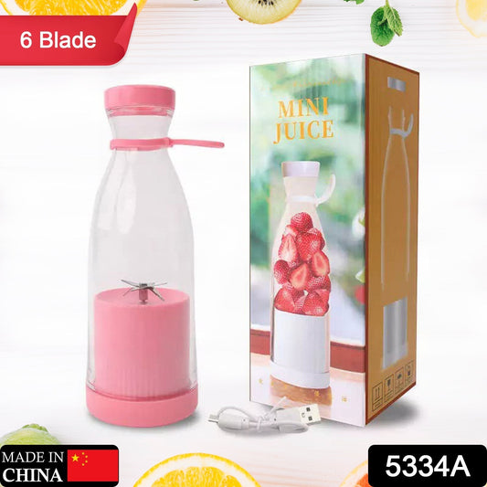 Portable blender charging via USB, highlighting its cordless convenience.