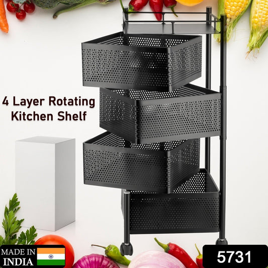 Close-up of the rotating metal mesh basket on the kitchen trolley, showing its ventilation.
