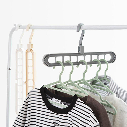 Front view of the Organivo 9-hole plastic hanger, showcasing its multi-slot design.