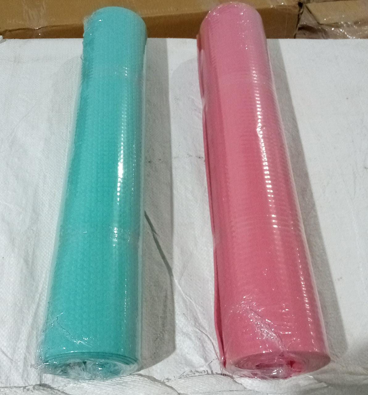 Vibrant Eco-Friendly Yoga Mat laid out in a bright home workout space.