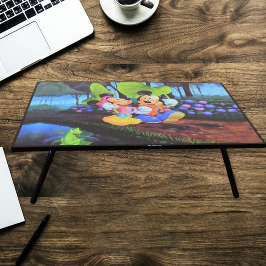 A vibrant cartoon-printed kids study table with foldable legs, perfect for learning and play.