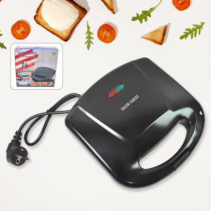 Dabster 2-slice sandwich maker with non-stick plates on a kitchen counter.