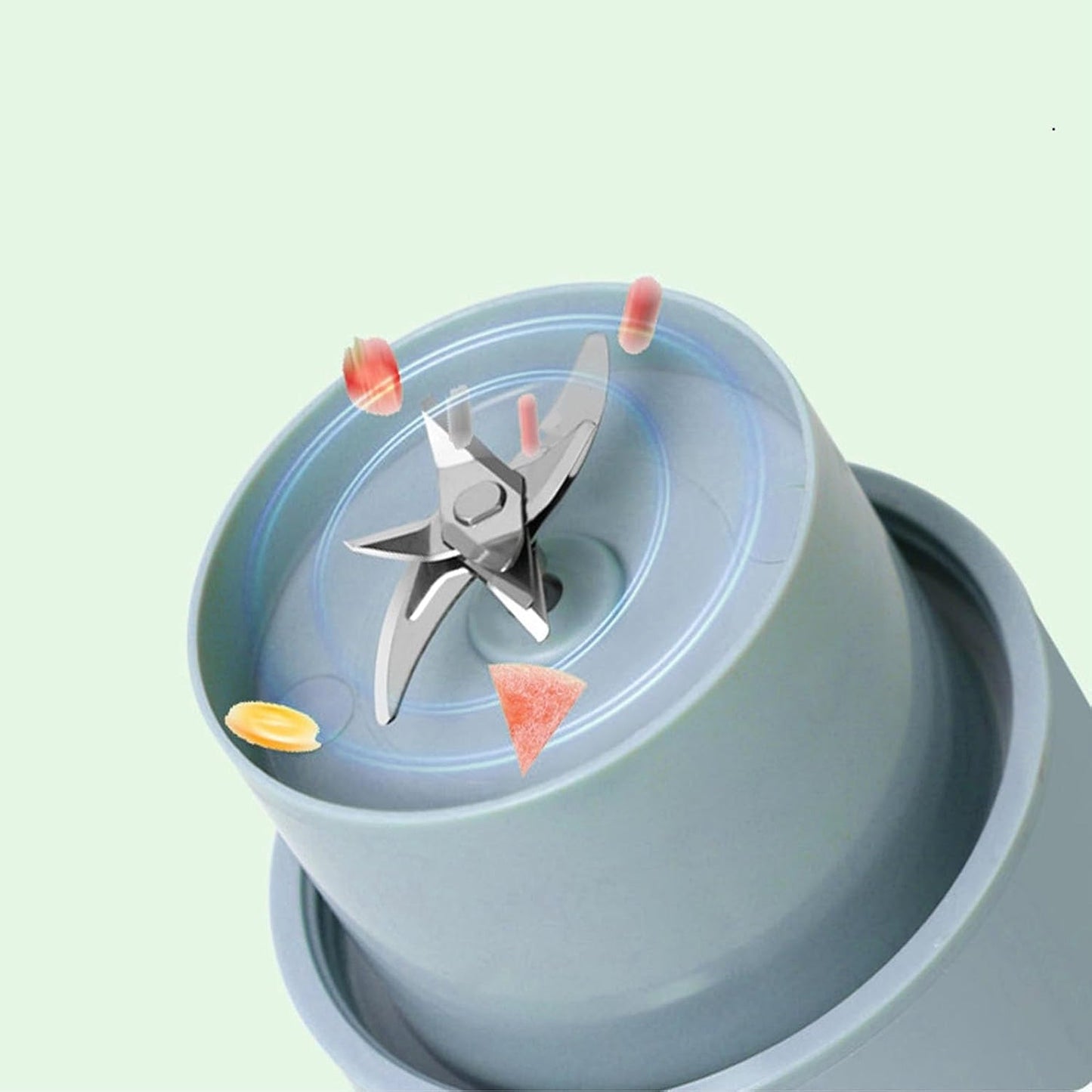 Compact electric juicer in action, blending fruits.