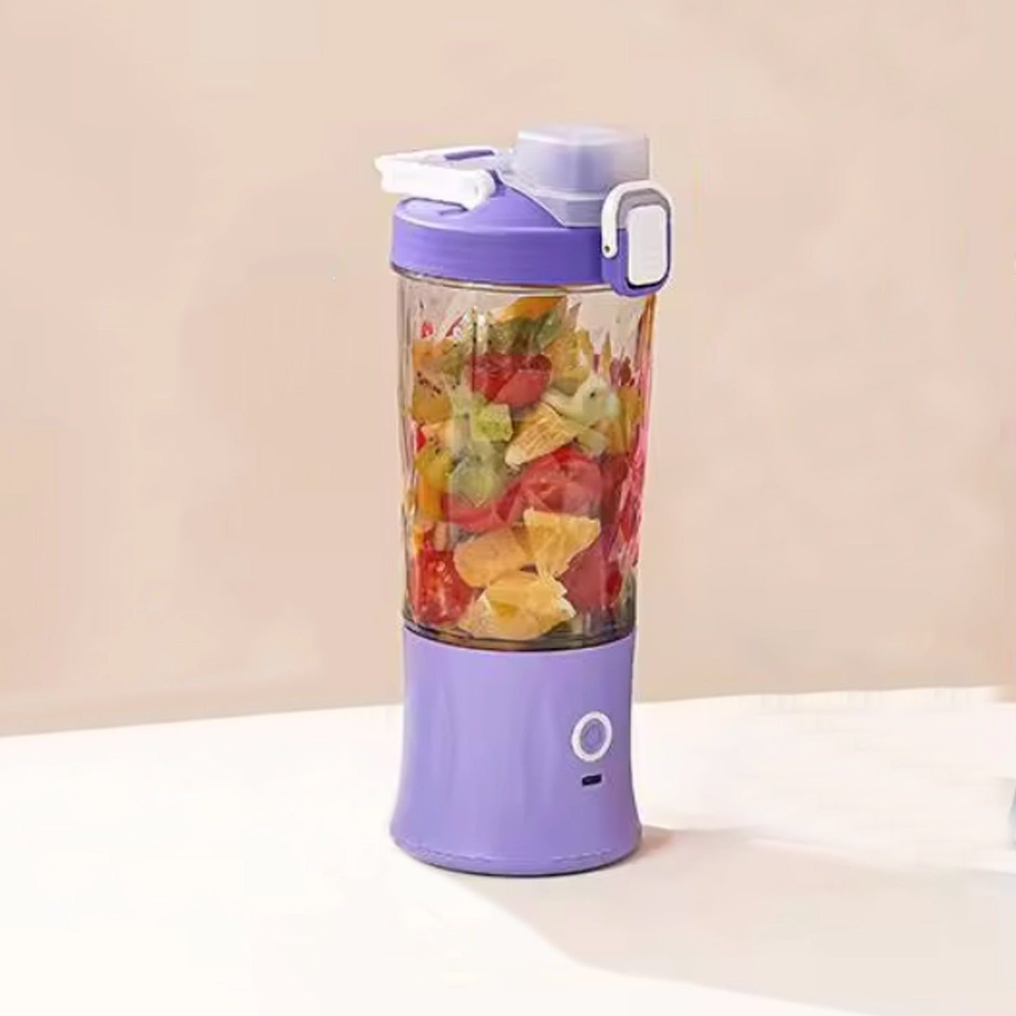 The portable juicer connected to its USB charging cable, highlighting its convenience.