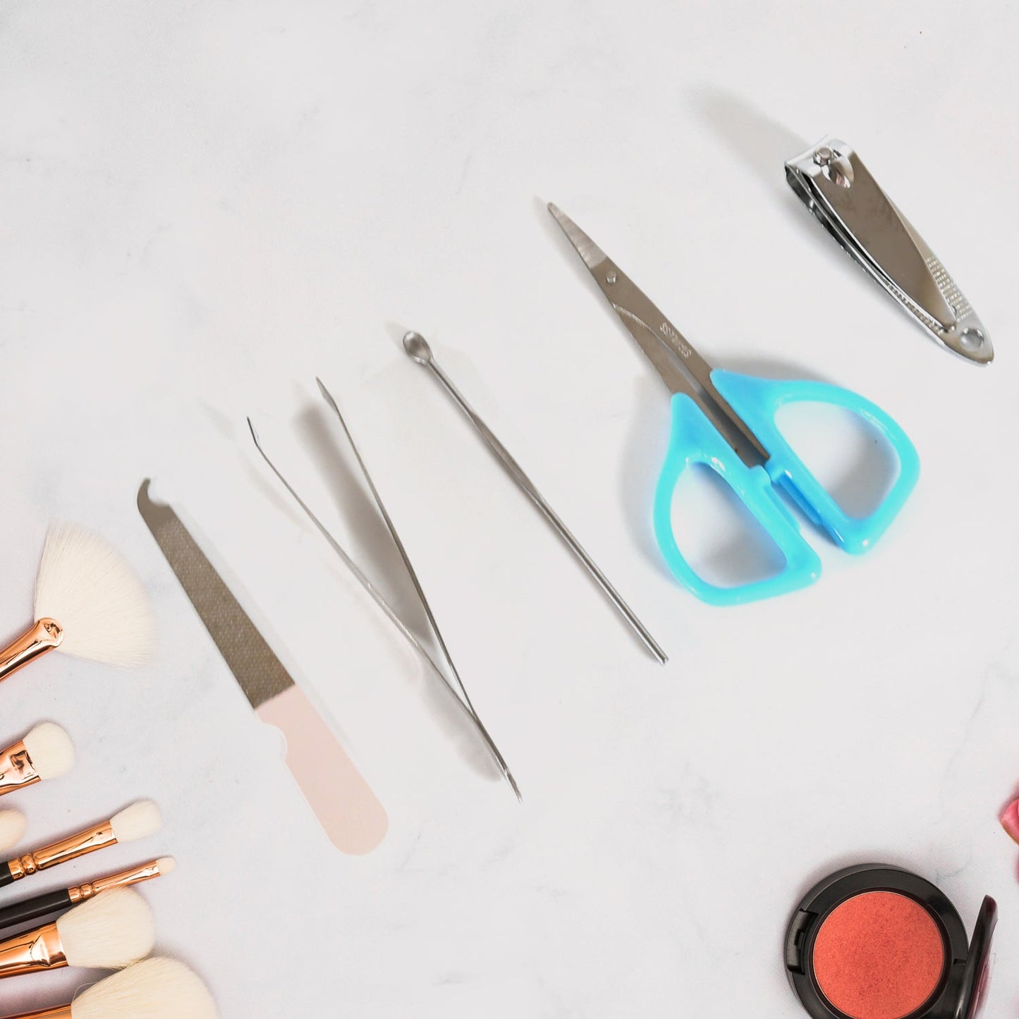 Complete stainless steel manicure set neatly organized in a stylish black PU leather case.