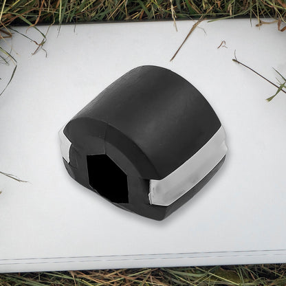Side profile of the black Jaw Exerciser, showing its compact size.