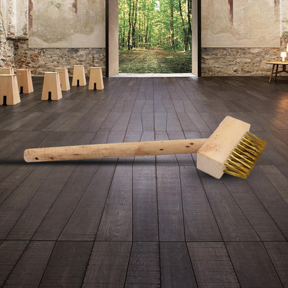 Patios cleaner brush showing its angled head for reaching tight gaps.