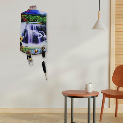 Stylish wooden wall decor with hooks, perfect for keys or small items.