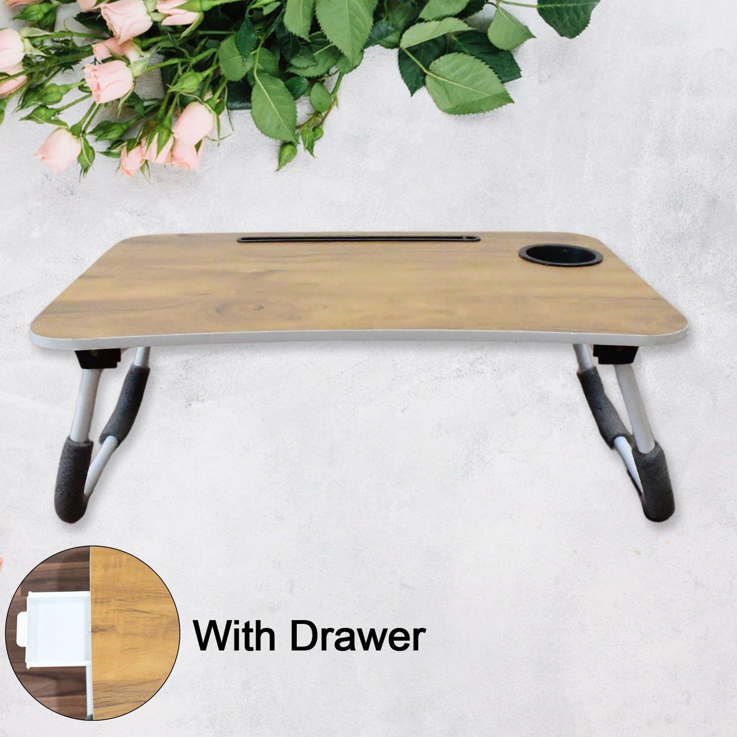 foldable laptop table used for studying with books and a tablet, highlighting its versatility.