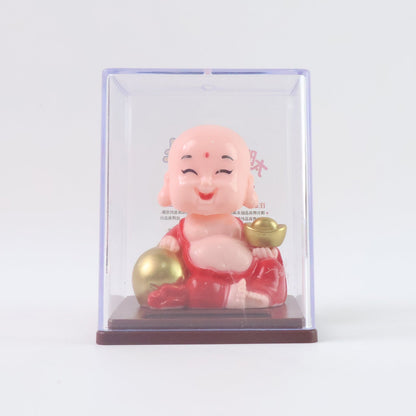Top-down view of the Solar Buddha Car Ornament, showcasing its compact design and vibrant colours.
