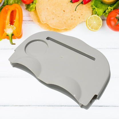 Snack Caddy Tray in use on a sofa, holding popcorn and a beverage.