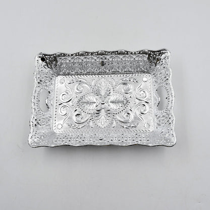 Decorative mukhwas serving tray beautifully arranged on a modern dining table.
