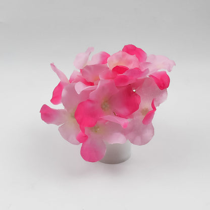 Decorative LED light featuring a realistic flower design, perfect for enhancing home ambiance.