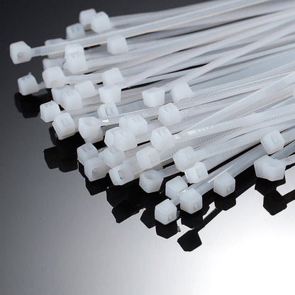 Detailed view of a nylon cable tie's rounded edges, designed for safe handling.