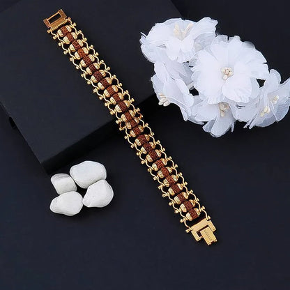 Golden Rudraksha Bracelet displayed in a spiritual Rakhi style, suitable as a thoughtful gift.