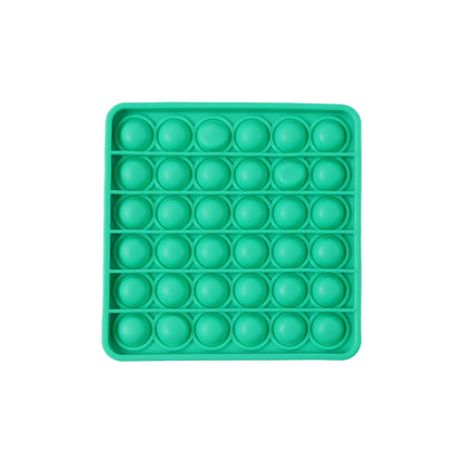 Square-shaped silicone Pop It toy in detail