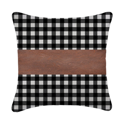 Elegant design of a faux leather and cotton pillow cover enhancing a bedroom.