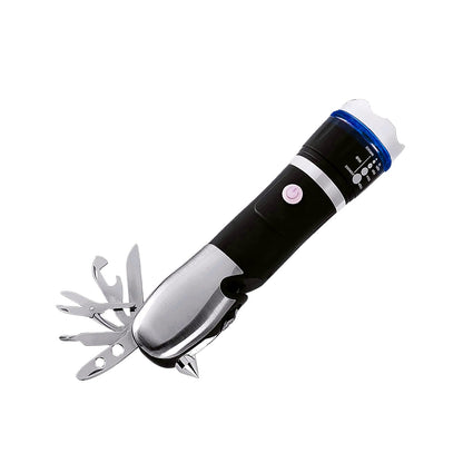 The black and silver multi-tool LED flashlight with its tools extended, casting a shadow on a pure white background.