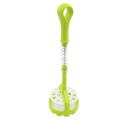 The versatile potato masher shown mashing sweet potatoes in a bowl.