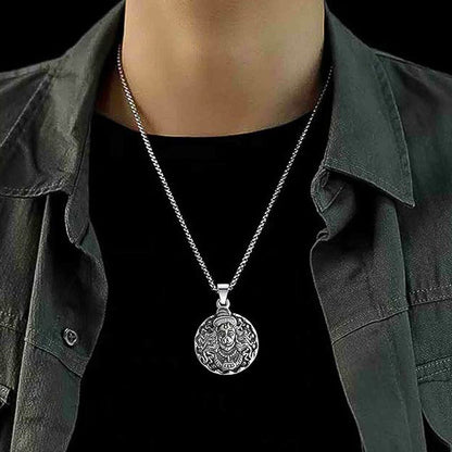 Side view of the Hanuman pendant, highlighting its craftsmanship.