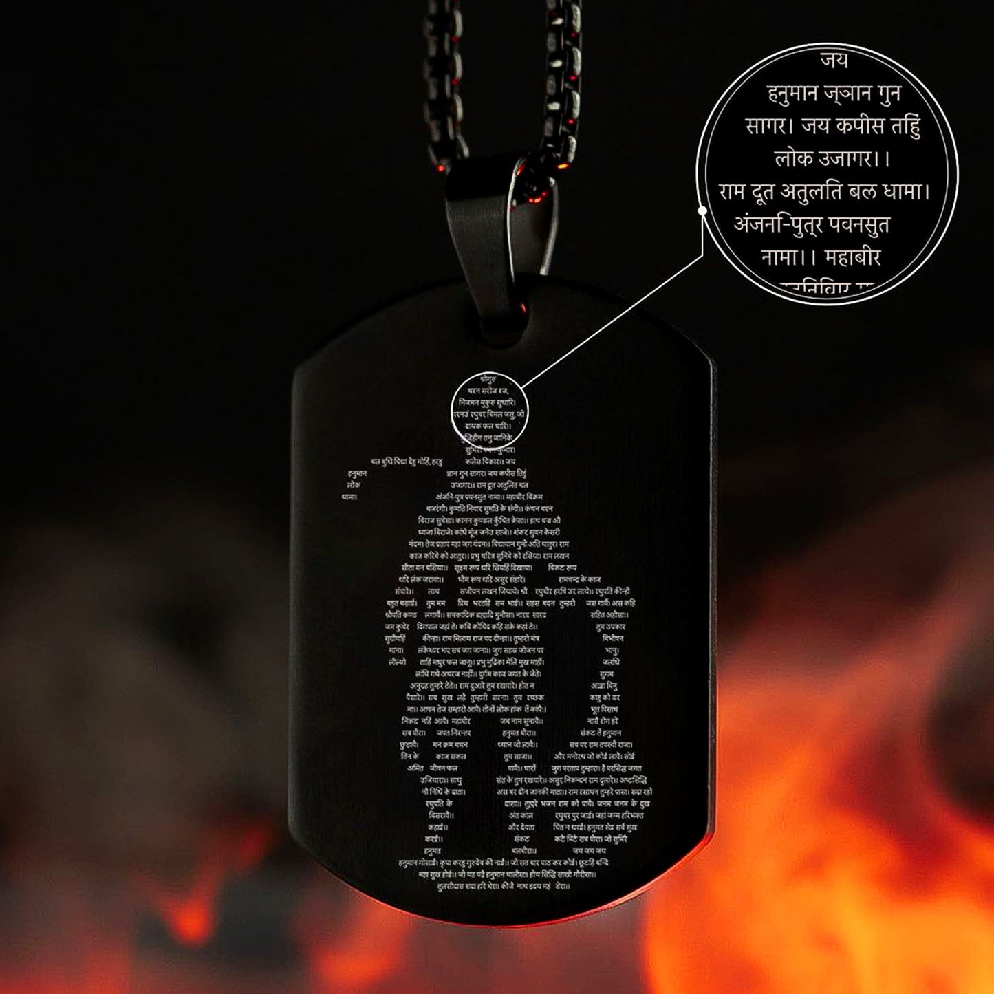 Detailed shot of the Gada micro-carved tag within the spiritual jewellery.