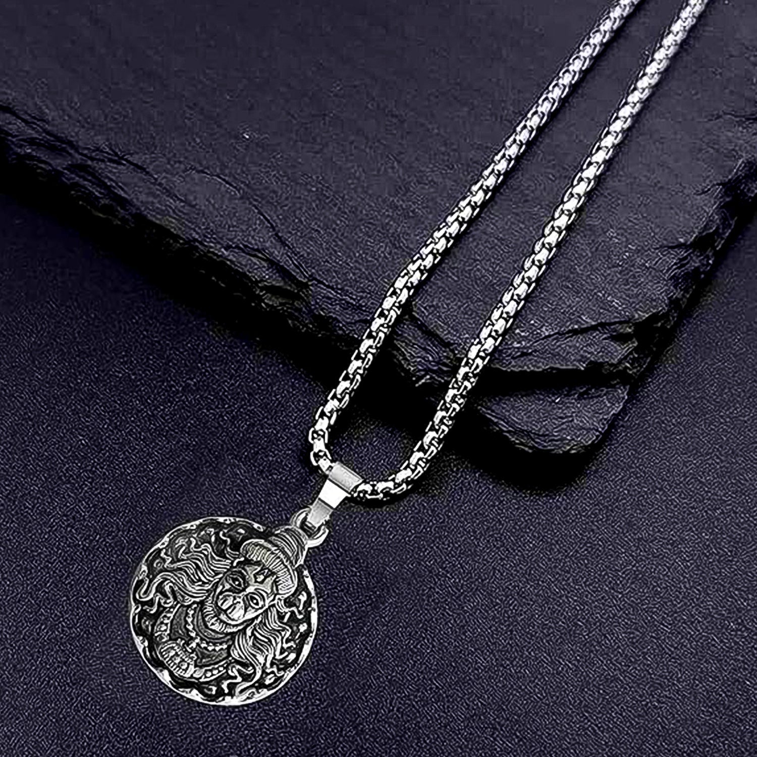 Detailed view of the Hanuman Locket with its accompanying chain.
