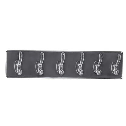 Stylish hooks rail placed in a bedroom, neatly organizing clothes and accessories.