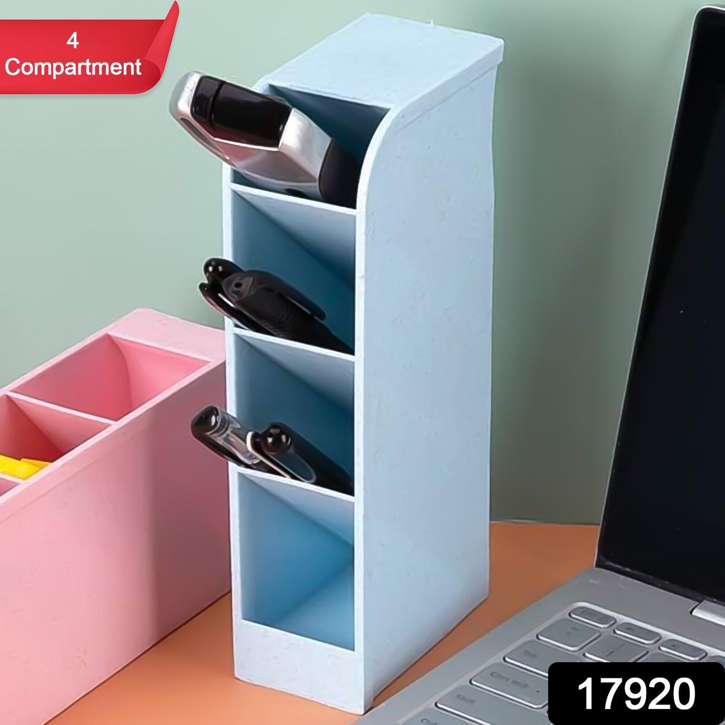 Top-down view of the 4-compartment stationery organiser filled with various office supplies.