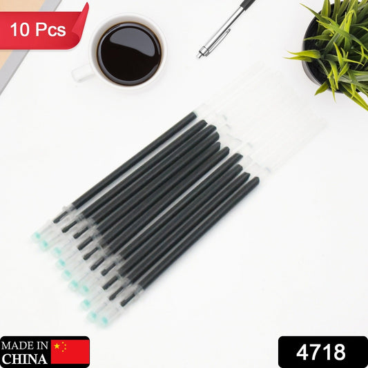 Close-up of a single universal black ball pen ink refill.