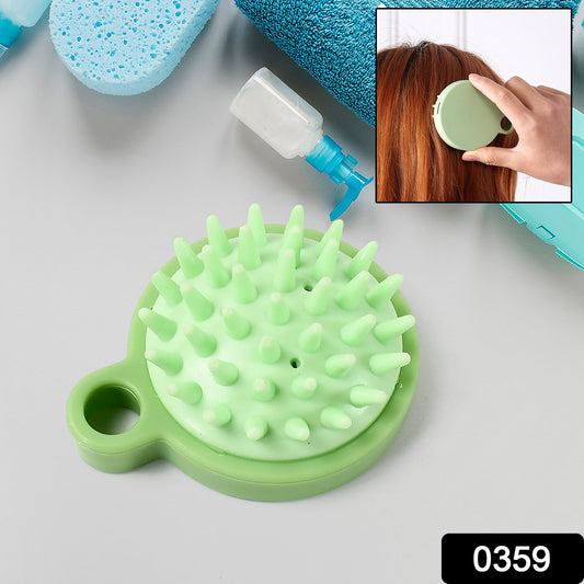 Ergonomic scalp massage comb held in hand, highlighting its comfortable grip and portable size.
