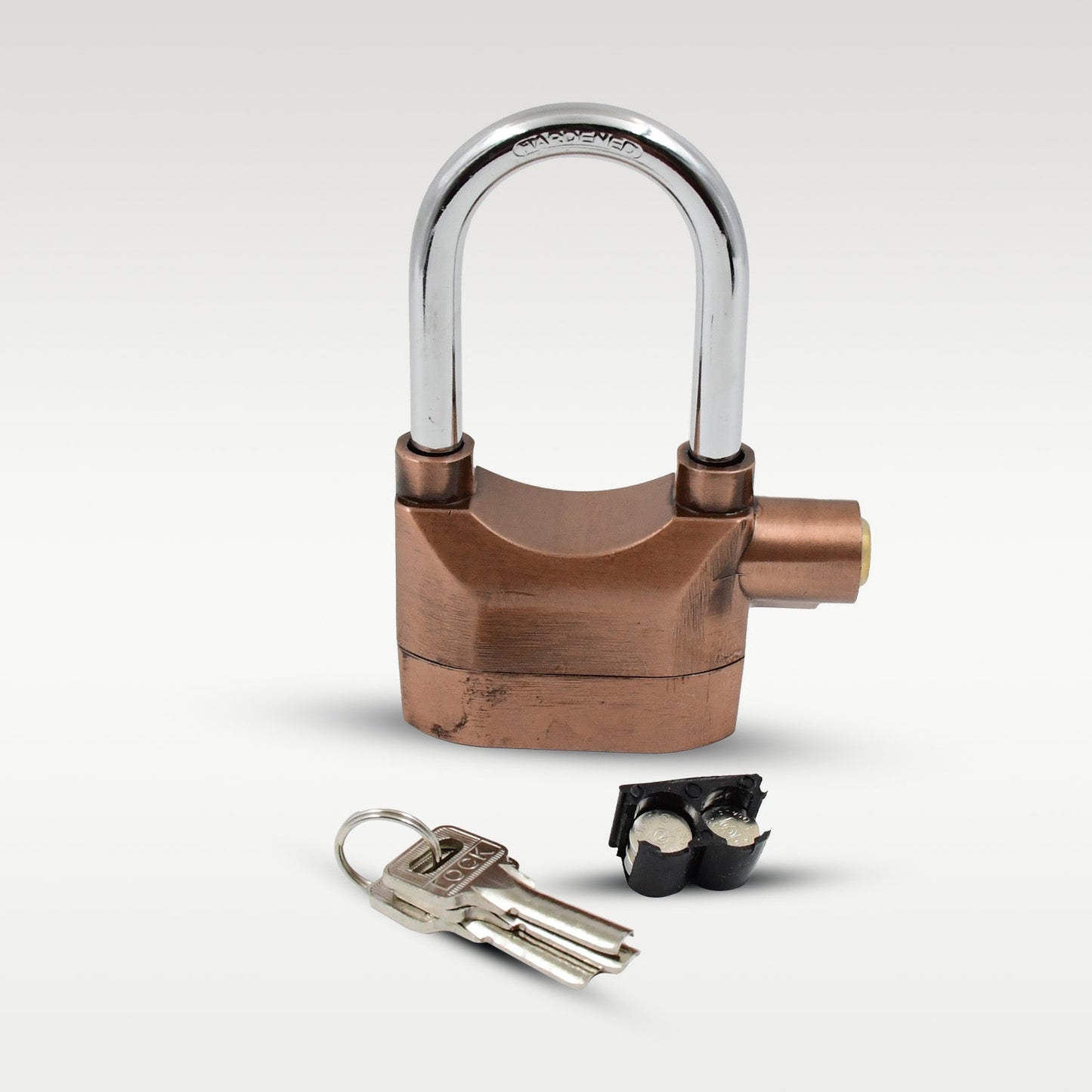 The robust aluminum alloy Security Alarm Lock with keys on a textured surface.