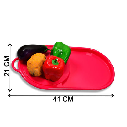 Plastic chopping board with tray, demonstrating its compact design.