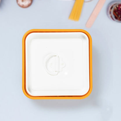 Demonstration of using the Paneer Maker to press excess water from cheese.