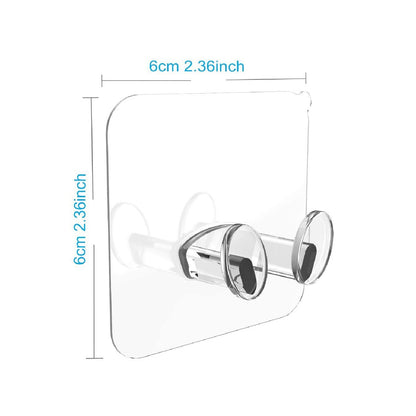 Multi-use transparent wall storage hooks installed in a bathroom, holding bath towels.