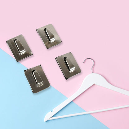 Reusable self-adhesive hooks easily repositioned on a smooth wall surface.