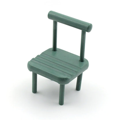 Close-up of the smooth, eco-friendly beech wood finish of the mini chair phone stand.