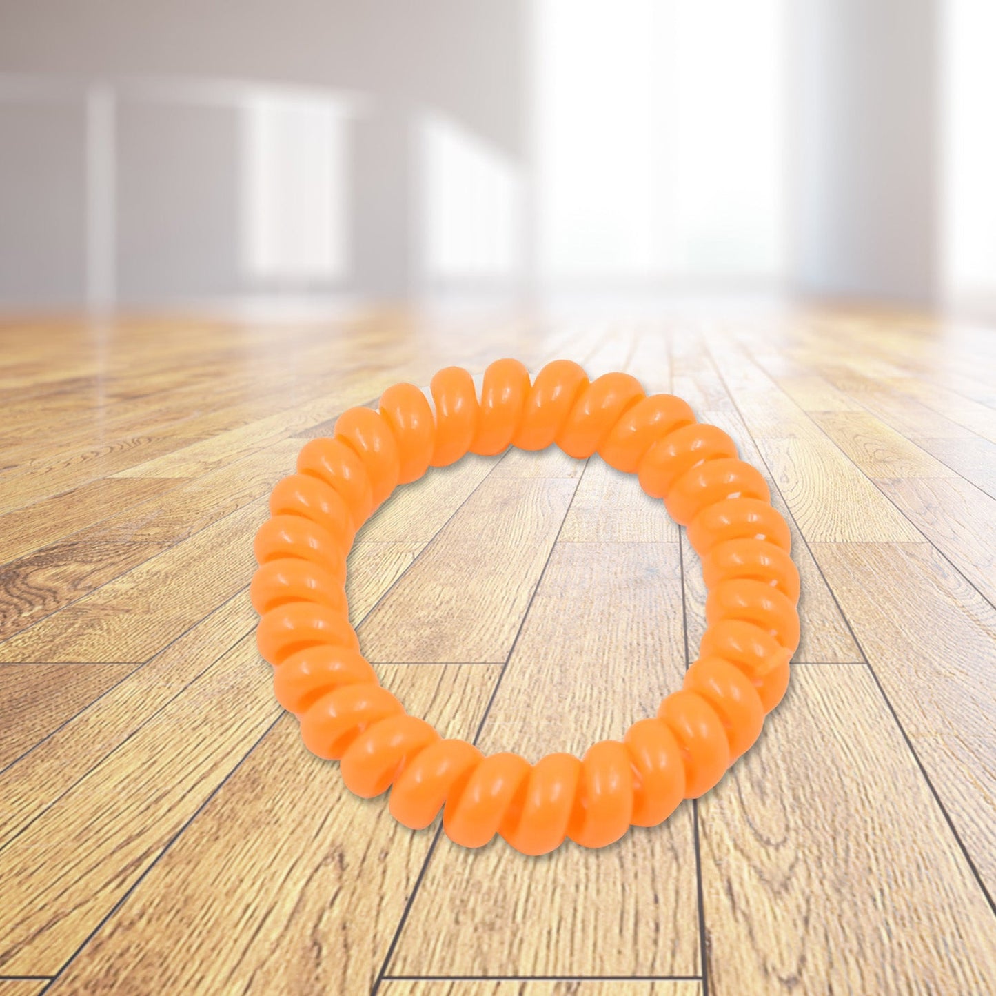 Close-up of a soft, stretchy telephone wire hairband.