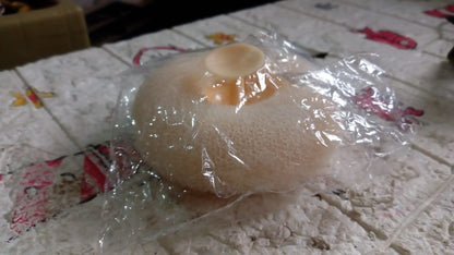 VelvaBloom flower bath sponge in its elegant packaging, ready for delivery.