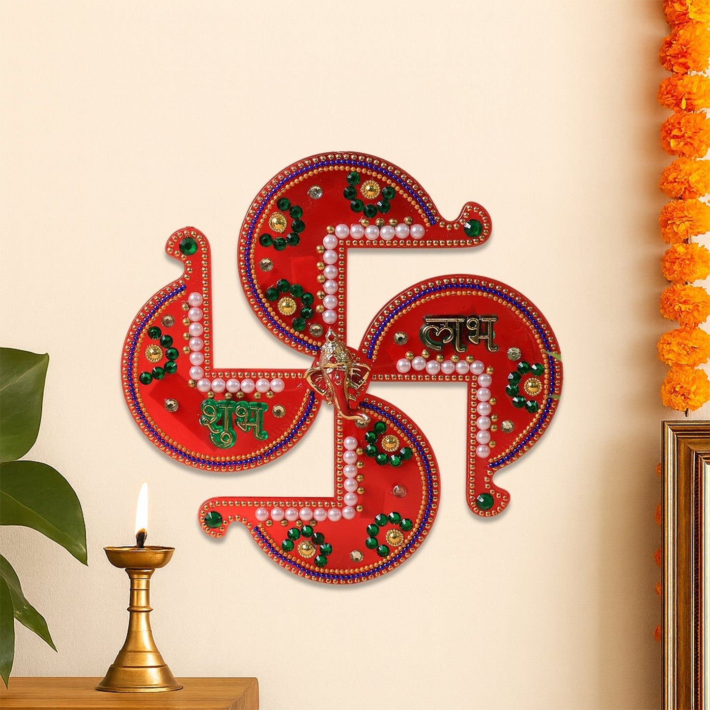 Golden-toned Acrylic Swastik Shubh Labh wall art decorated with pearls and Ganesha motif