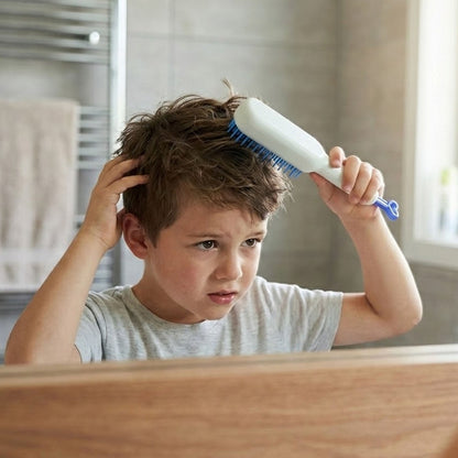Demonstration of the Self-Cleaning Hairbrush's one-pull cleaning mechanism