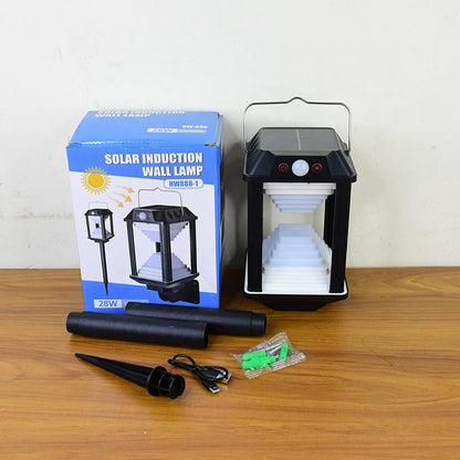 Solar motion sensor LED light illuminating backyard and garden area