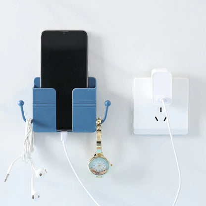 Elegant wall-mounted mobile stand with hook, blending seamlessly into home decor.