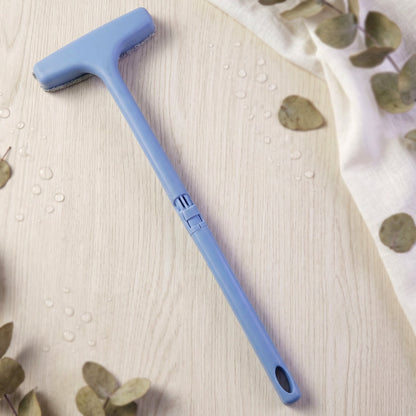 The soft bristles of the window mesh cleaner gently cleaning delicate screen surfaces.