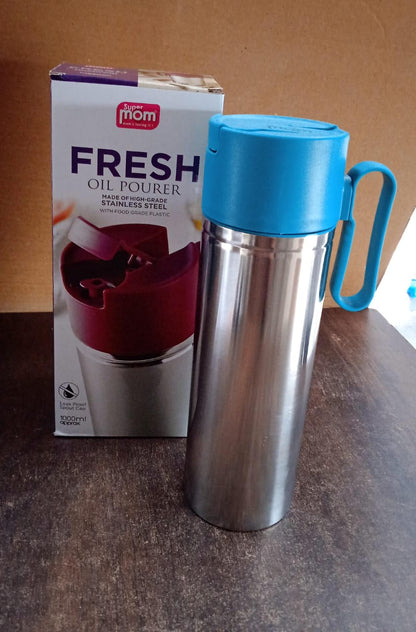 Kitchen oil dispenser bottle with easy grip handle and leak-proof flip lid