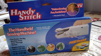 Detailed view of the mini electric sewing machine, showing its ergonomic grip.