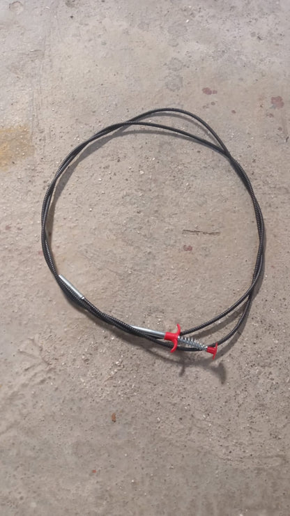The effective drain cleaner tool with its spring and claw, designed for easy clog removal.