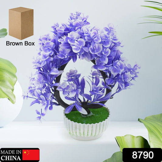 Stylish artificial plant with a cute white pot displayed on a wooden surface, adding a touch of green to any room.