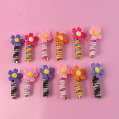 Colourful Hairbands Showing Cartoon Characters and Spiral Wire Design