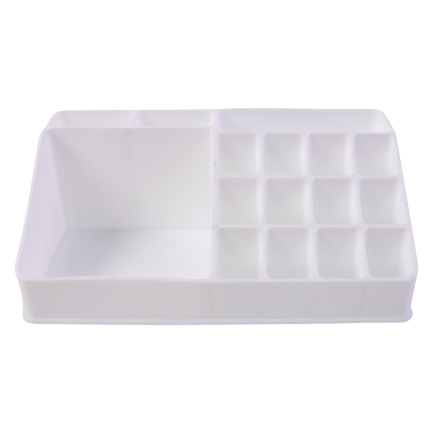 Pull-out drawer of the clear makeup organiser holding compacts and small items.