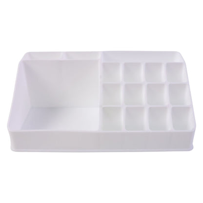 Pull-out drawer of the clear makeup organiser holding compacts and small items.